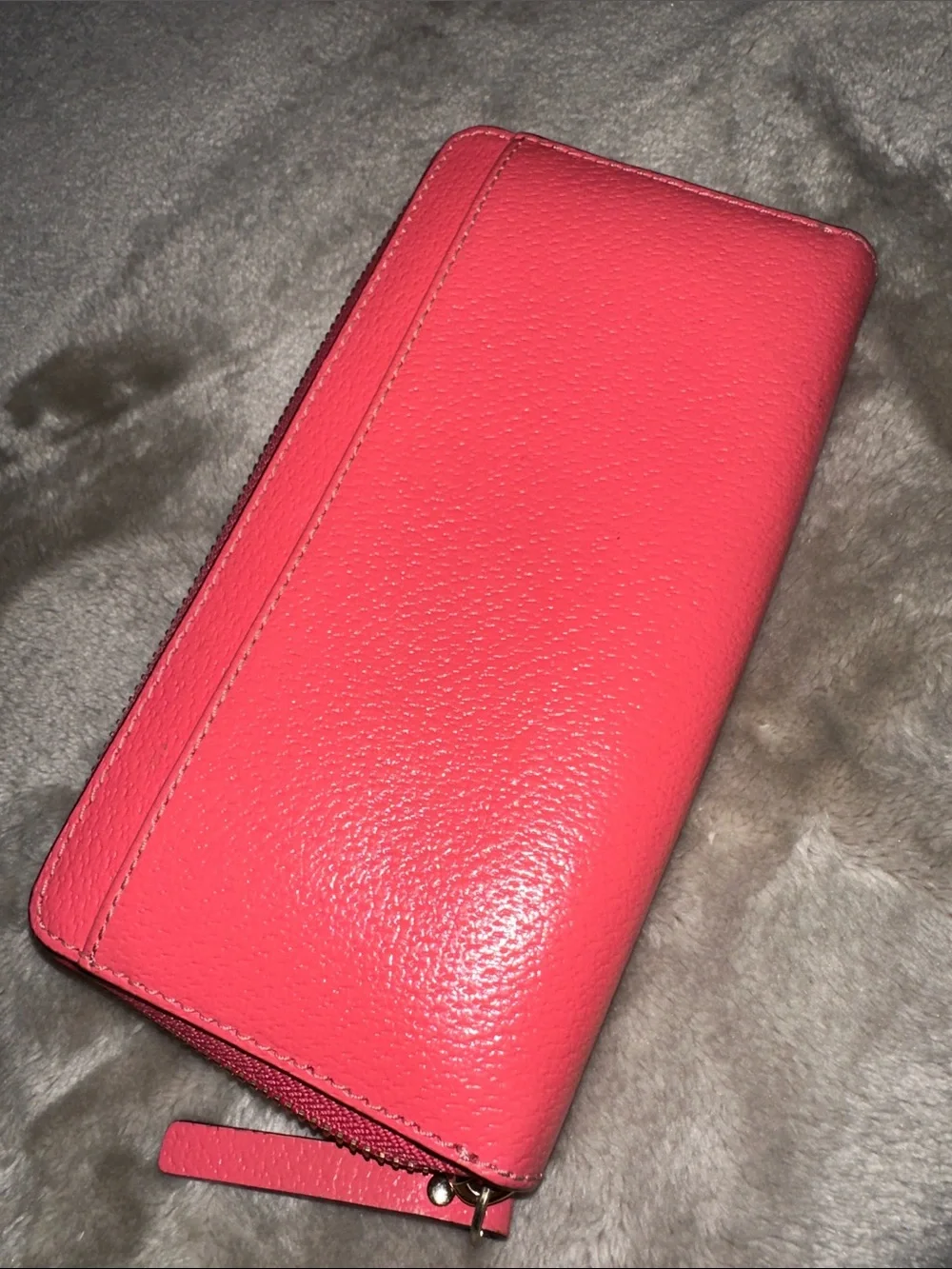 kate spade coral pink pebbled leather wristlet